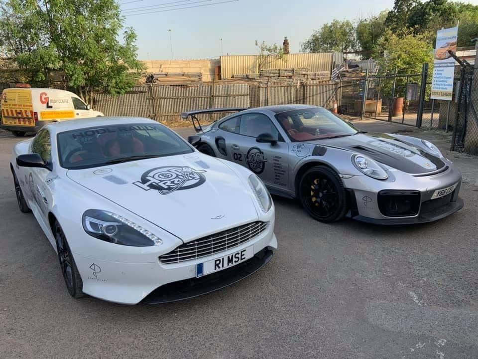 The original Aston Martin DB9 GT and Porsche GT2 RS from the first HODL Rally in 2019