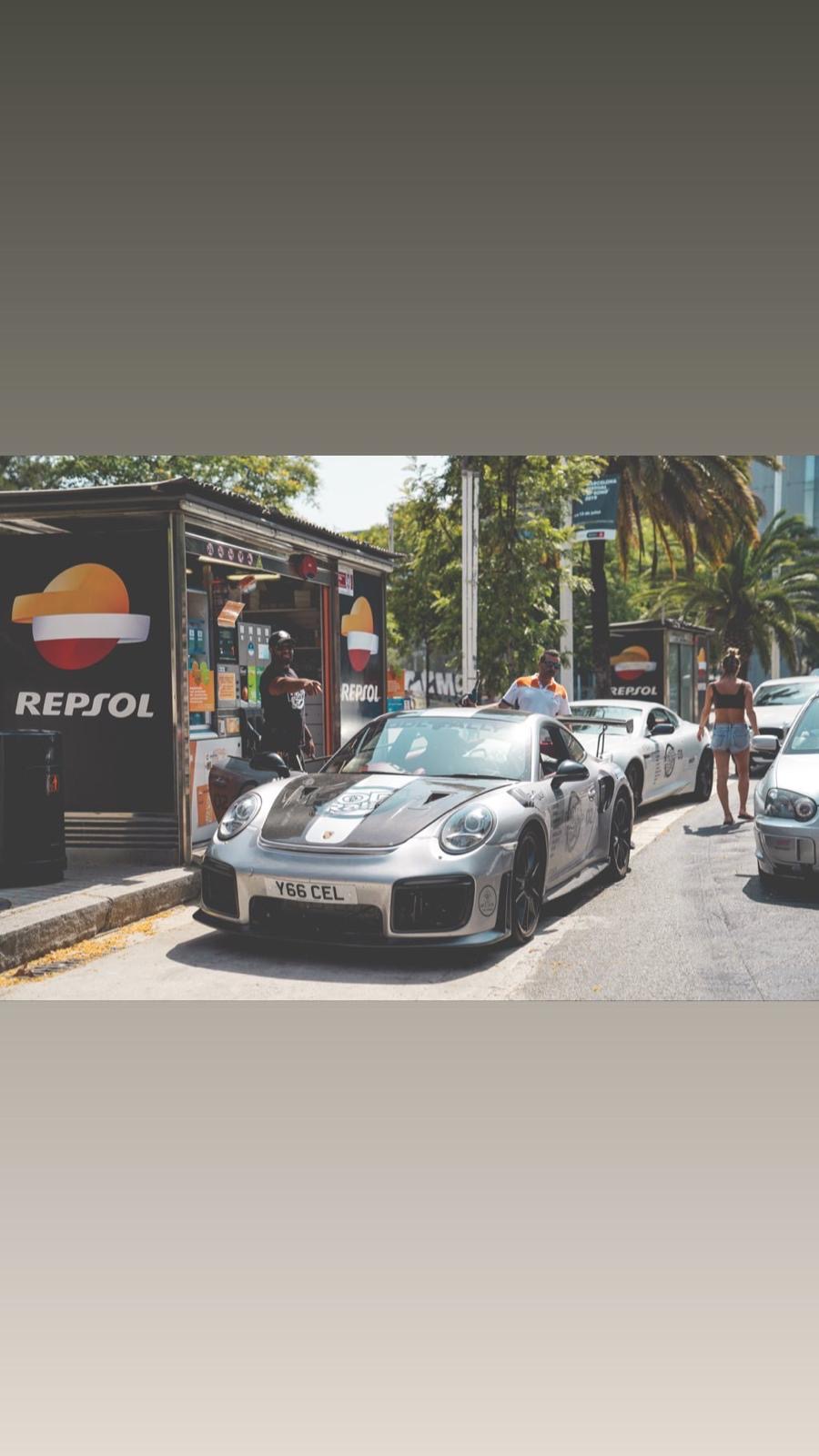 HODL Rally Porsche and Aston Martin at a Repsol stop in Valencia